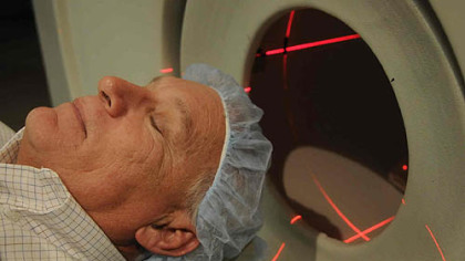 At UPMC Presbyterian, Alan Romatowski prepares for a brain scan on Nov. 20 as part of a study at the University of Pittsburgh Alzheimer Disease Research Center. Mr. Romatowski is battling early-onset Alzheimer's disease.